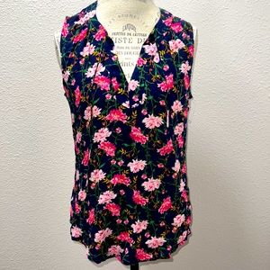 Sleeveless blouse w/ V-neck. dress up or wear it for casual outing. “like New”